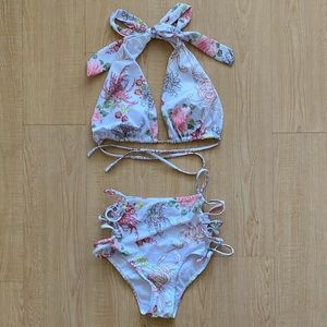 NWOT white and floral bikini with cool laced sides